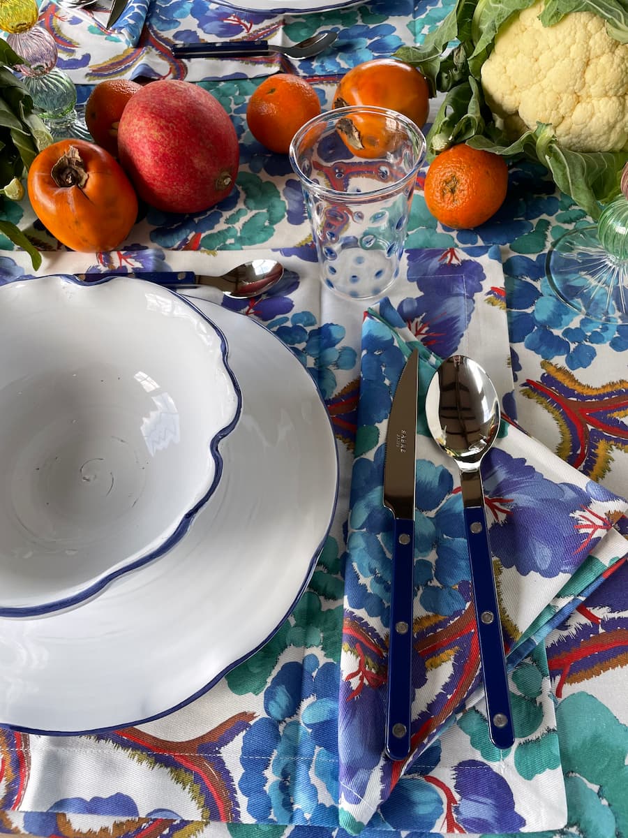 white petaled bowl with blue rim 19cm