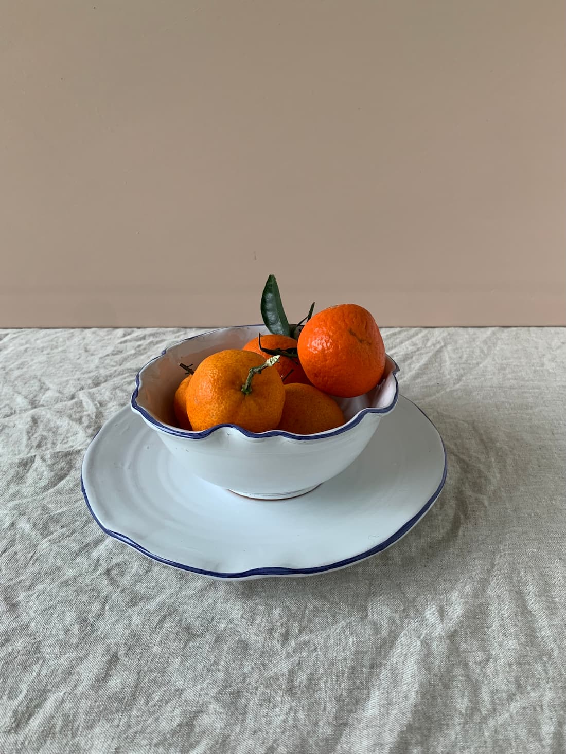 white petaled dinner plate with blue rim 27cm