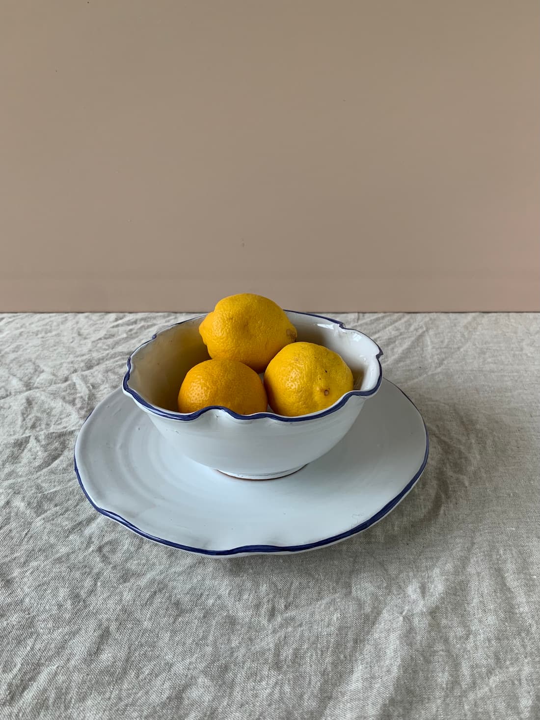 white petaled dinner plate with blue rim 27cm