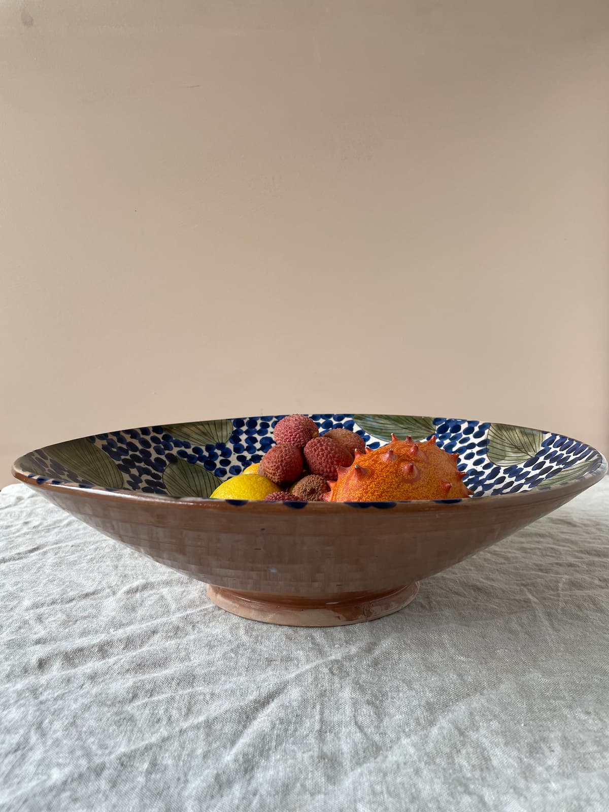 large serving bowl green leaves
