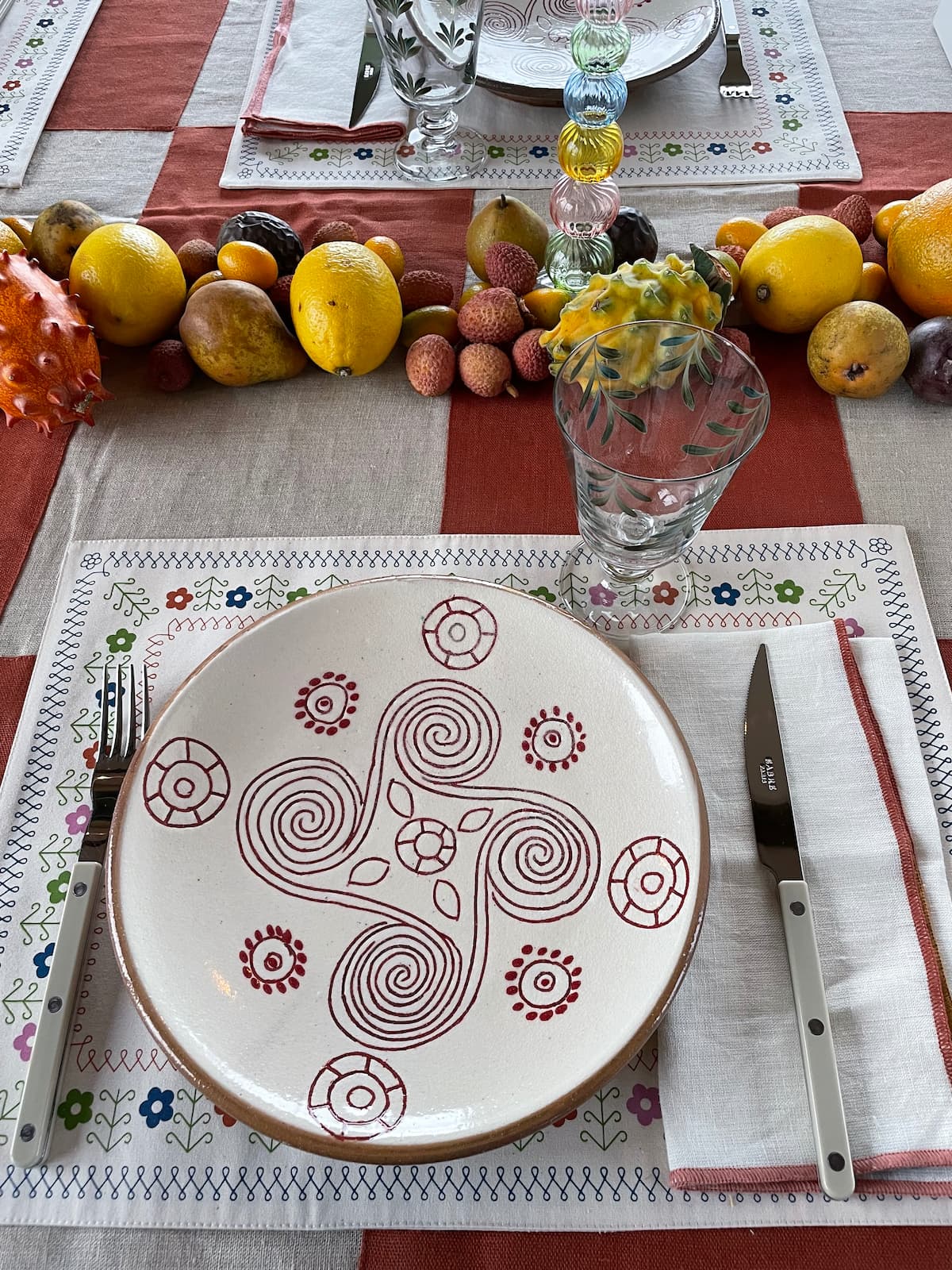 red swirl dinner plate